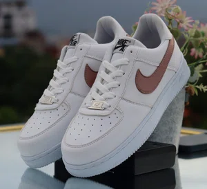 Women's Low-Top Leather Sneakers with Rose Gold Accent - White - Available at AfnoBazar Nepal