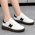 Women's White and Black Retro Low-Top Sneakers - Available at AfnoBazar Nepal
